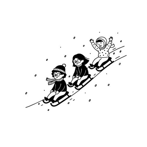 Kids sledding down a snowy hil
